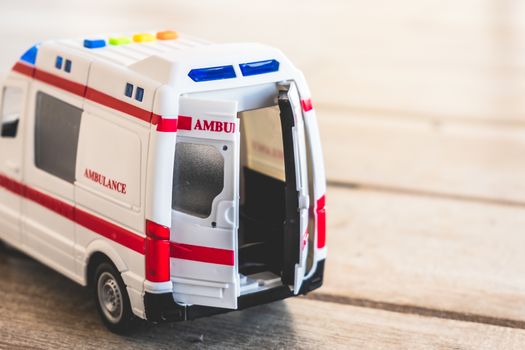 ambulance doors background health care toy close up .
