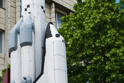 monument with a reduced copy of reusable spacecraft, rocket