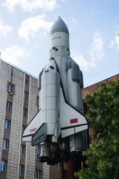 monument with a reduced copy of reusable spacecraft, rocket