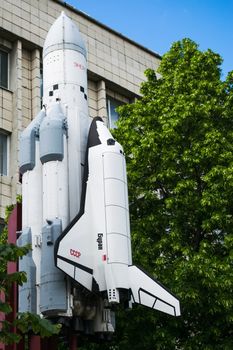 monument with a reduced copy of reusable spacecraft, rocket