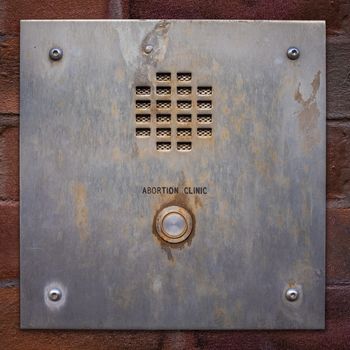 Grungy Entry Buzzer For A Backstreet Abortion Clinic