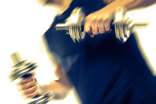 Gym equipment and sport concept.Strong and motion background.Dumbbells.