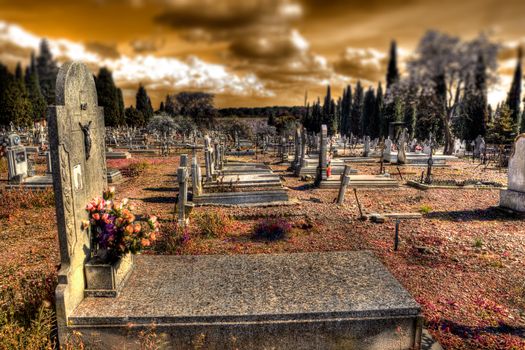 Scenic cemetery  and tombstone.Gravestone and Halloween background.Surreal graveyard.