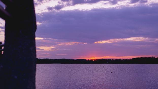 Violet purple sunset, Black sea surface under lilac sky