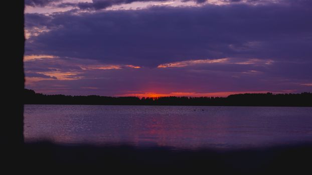 Violet purple sunset, Black sea surface under lilac sky