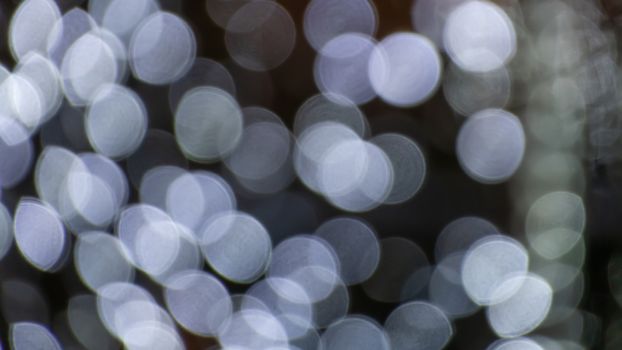 Abstract & Festive background with bokeh defocused lights