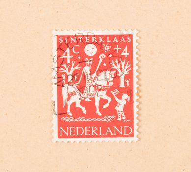 THE NETHERLANDS 1960: A stamp printed in the Netherlands shows the dutch holiday of Sinterklaas, circa 1960