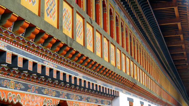 The beautiful architecture of a Buddhist Monastery in a long corridor, in Thimpu, Bhutan