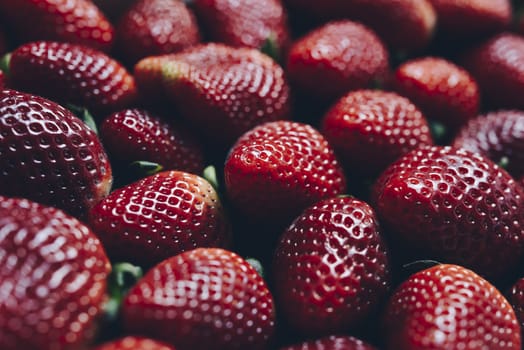 close-up of fresh red strawberries, healthy sweet food, vitamins and fruity concept, food frame background