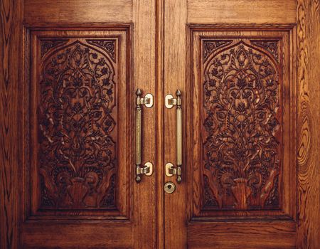 Background of Wooden Door Carved with Floral Ornament