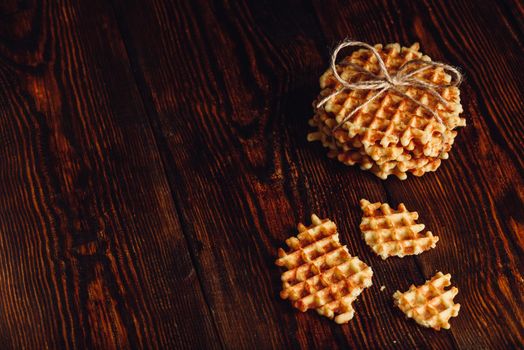 Belgian Waffles on Wooden Surface with Copy Space on the Left.