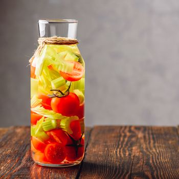 Water Infused with Cherry Tomato and Celery. Copy Space on the RIght Side.