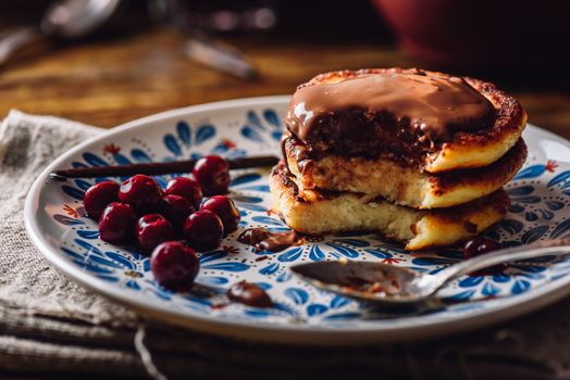 Quark Pancakes with Hazelnut Paste, Frozen Cherry and Vanilla Pod.