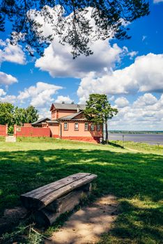 Civil War Museum on Rural Island Sviyazhsk in Russia. And Rustic Bench on the Foreground.