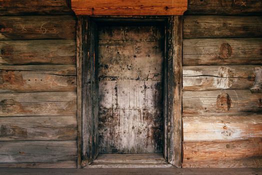 Old and Weathered Wooden Wall with Door.