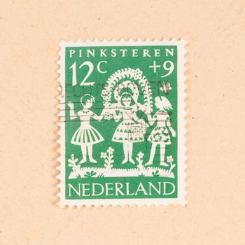 THE NETHERLANDS 1960: A stamp printed in the Netherlands shows the dutch holiday of Pinksteren, circa 1960