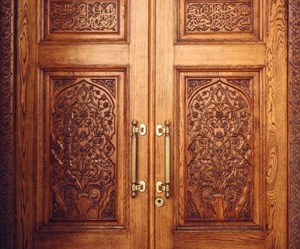 Background of Wooden Door Decorated with Floral Ornament