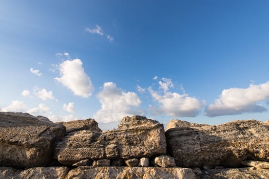 Granite rocks and ocean water in a Cancun beach, Mexico.