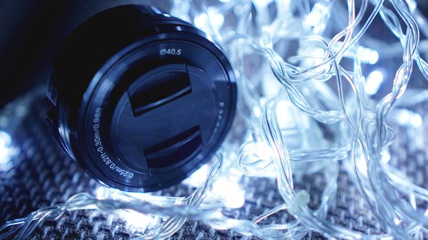 Photo lens with lens reflections close up shot with blue lights