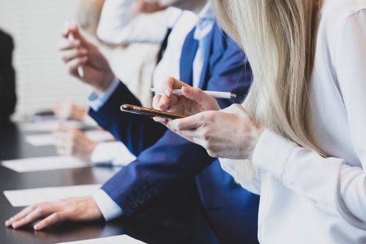 Business people working with documents in conference room