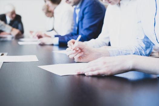Business people working with documents in conference room