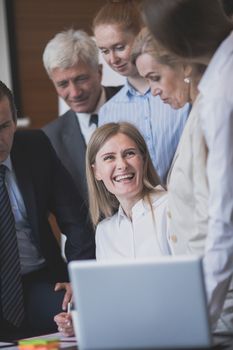 Business team interacting at meeting Focus on happy laughing woman , joy , success, unity concept