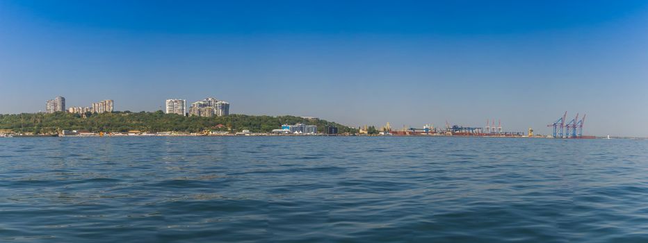 Odessa, Ukraine - 08.28.2018. Coast of Odessa city, Ukraine. Panoramic view from the sea in a sunny summer day.