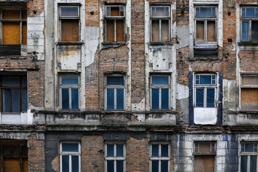 A front of the building in the center of Warsaw that is partially destroyed by nature and climate. Grunge look makes it feel depressed. Colored with complementary colors to make it more contrast looking on electronic devices