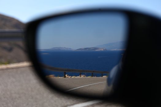 Picturesque view onto the marina via the auto mirror