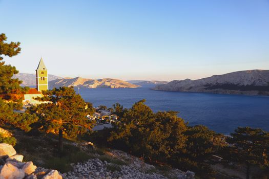 Summer bay shore in the evening in the Adriatic sea, Croatia. View from the hill