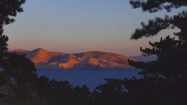 Evening summer bay shore in the Adriatic sea, Croatia. View from the hill