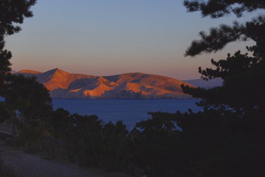 Evening summer bay shore in the Adriatic sea, Croatia. View from the hill