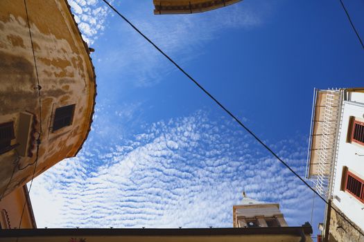 Summer sky view from the streets in the ancient european city
