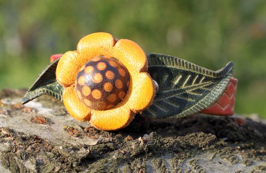 A leather bracelet with a flower eco style hand made