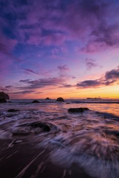 A very colorful and dramatic sunset over the Pacific Ocean.