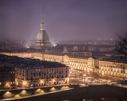 Piazza Vittorio Veneto in Turin, Italy, at night with Mole Antonelliana in the back