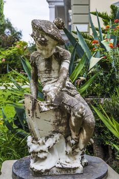 Small sculpture in Achilleion palace, Corfu. The Achilleion Palace can be found in the Village of Gastouri, 10 km south west of the town of Corfu.