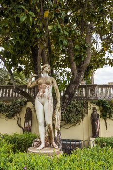 Statues in the courtyard of Achilleion palace of Empress of Austria Elisabeth of Bavaria. The Achilleion Palace can be found in the Village of Gastouri, 10 km south west of the town of Corfu.