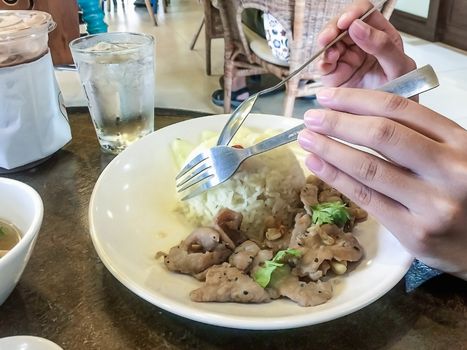 Garlic pork rice in a restaurant