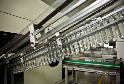 Production of the bottles plastic The Technological line on production of the plastic bottles. Conveyor automatic