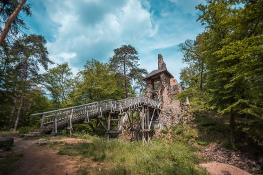 Castle ruin Zlenice with wooden bridge near Sazava river, Czech republic