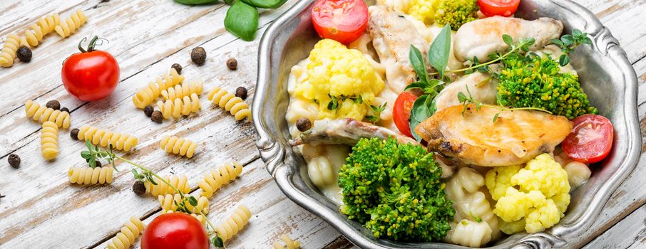 Italian pasta with chicken and broccoli.Italian food