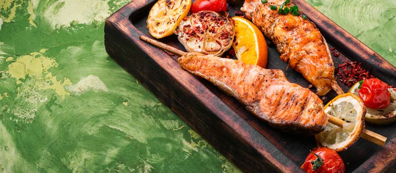Barbecue skewers with fish.Grill salmon shish kebab