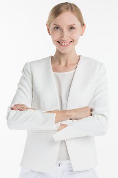 Portrait of mature smiling business woman in white suit isolated on white background