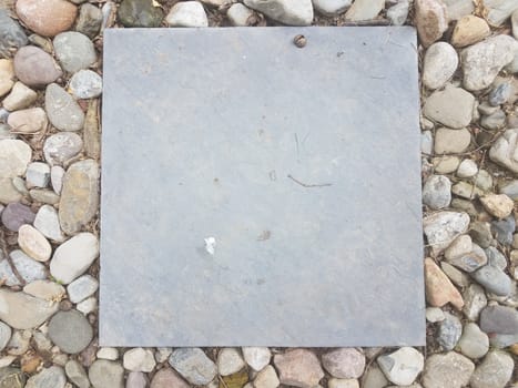 grey square tile and stones and rocks and pebbles