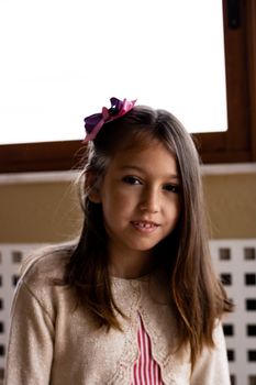 Portrait of little girl posing smiling