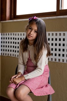 Portrait of little girl posing smiling