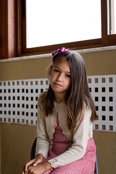 Portrait of little girl posing smiling