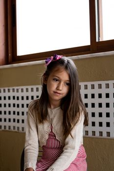 Portrait of little girl posing smiling