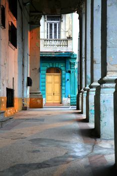 Typical portico under a colonial building in Old Havana, Cuba